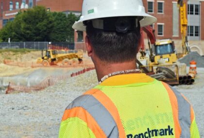 Benchmark operator working in location of underground utilities