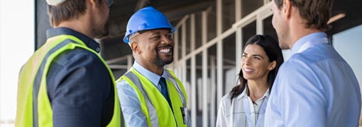 engineer shakes hands with clients