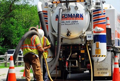Operators running vacuum pipeline to subsurface utilities